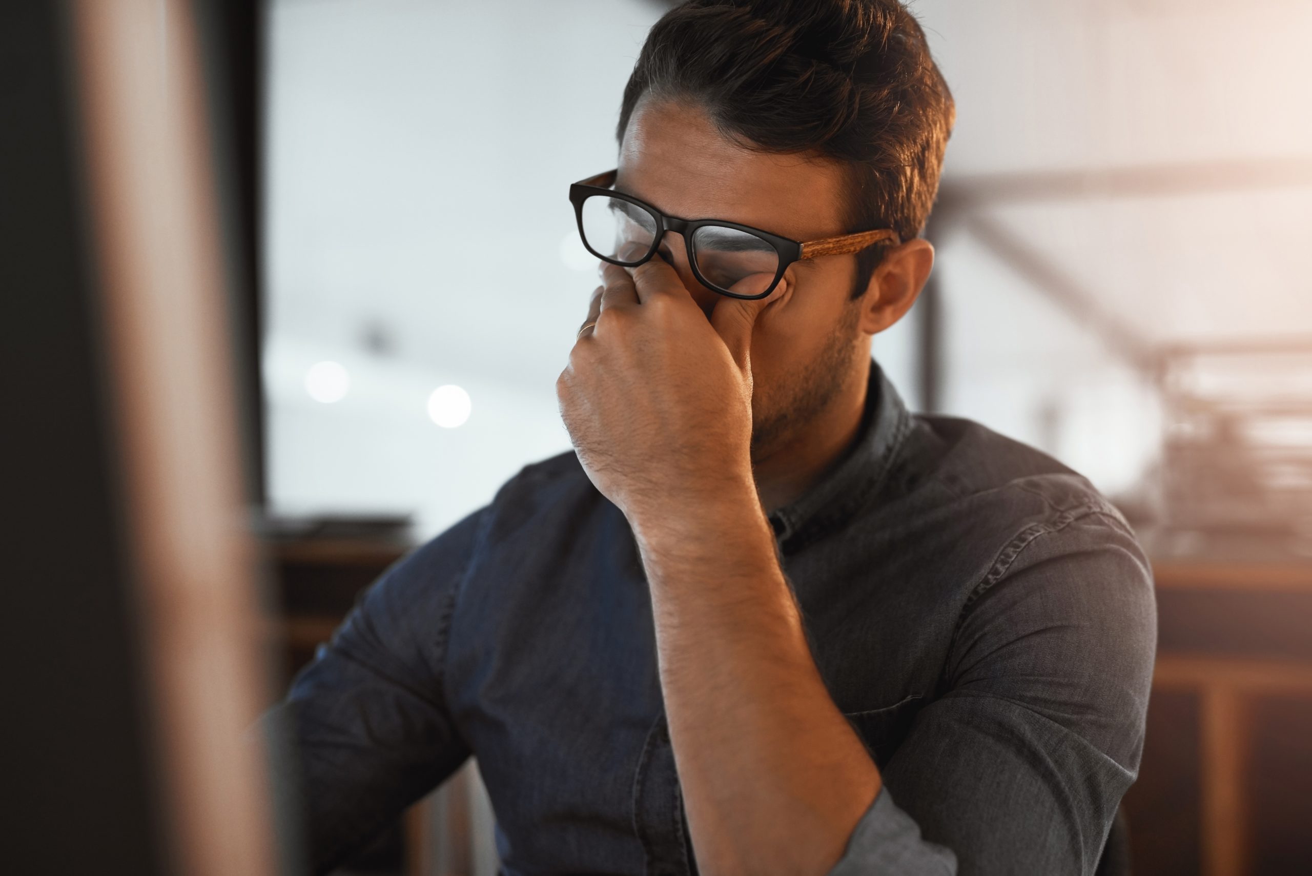 Man,,Stress,And,Eye,Strain,In,Office,At,Night,,Computer