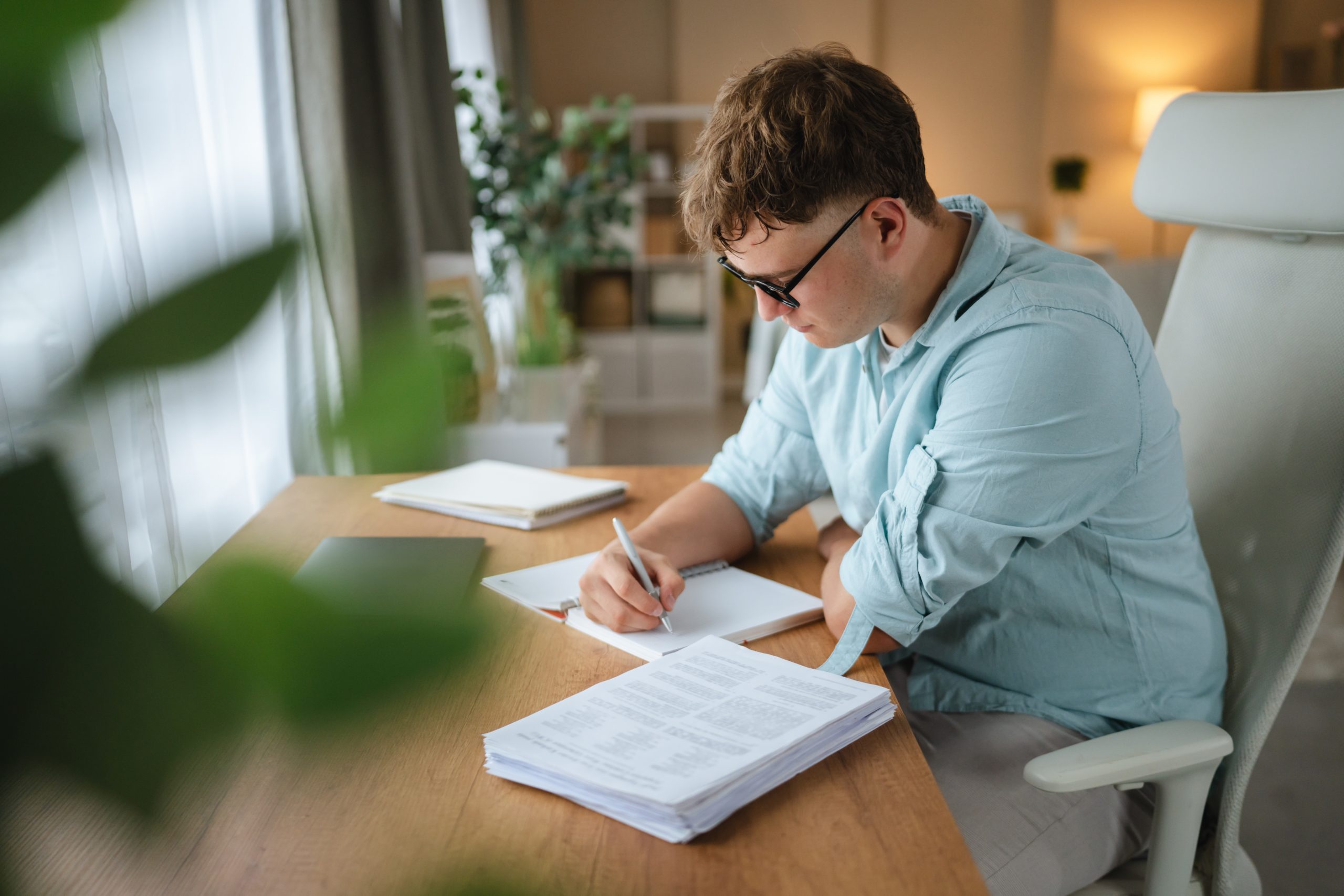 Young,Caucasian,Man,Student,Study,Or,Work,At,Home